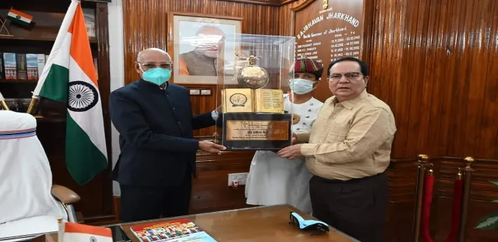 Binod Bihari Mahto Koyalanchal University emblem presented to the Governor and Chief Minister at the first convocation.